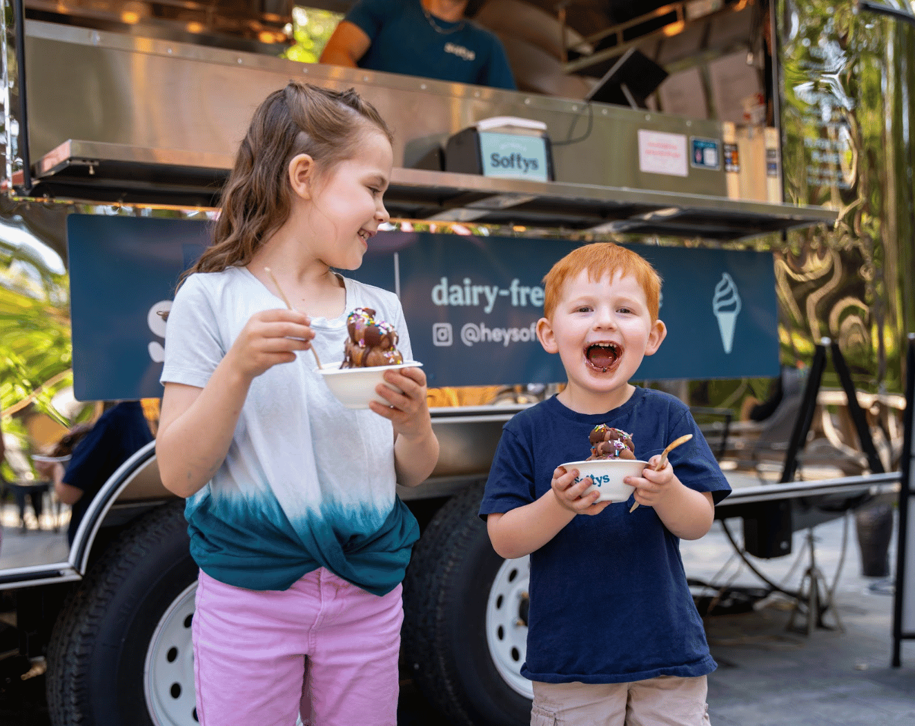 Two children enjoying Softy's treats at Malahat SkyWalk
